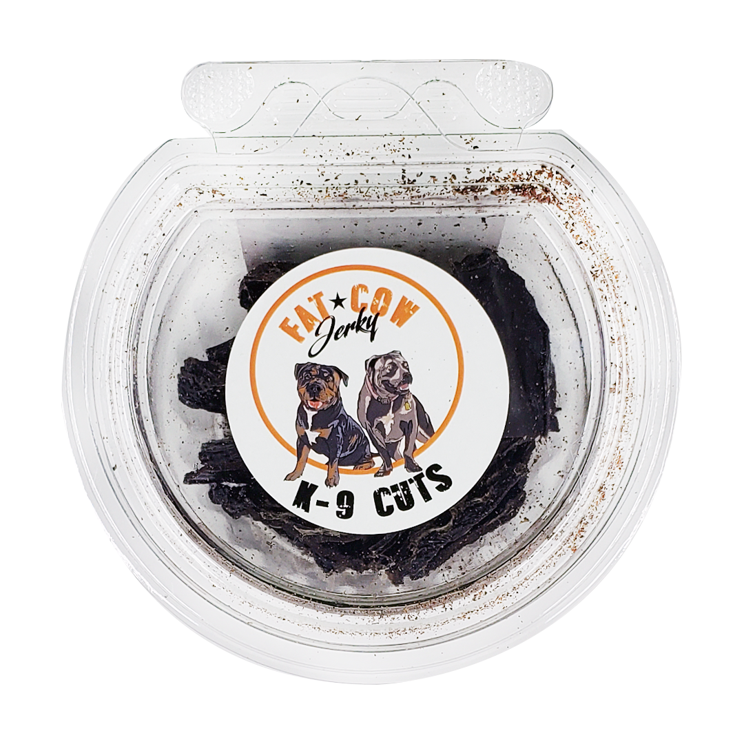  K-9 Cuts Cup - Beef Liver Flavor - 1.5oz container with reusable lid. Image features the Fat Cow logo with two dogs, ALL NATURAL INGREDIENTS - Back of Container. Top of the container. Nutritional values below in description. 