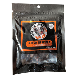 Fat Cow Jerky - Mango Habenero Jerky - Front of the package with window shoing jerky near the bottom