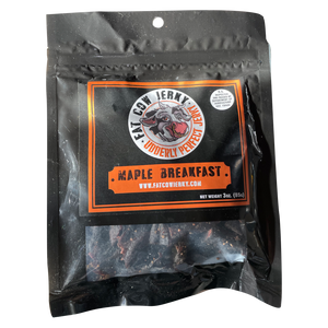 Fat Cow Jerky - Maple Breakfast Jerky -Front of the package showing a small window at the bottom making the beef jerky visible. 